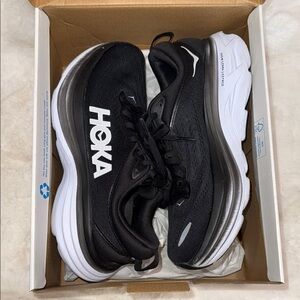 Hoka Black and White Athletic Shoes with Cushioned Sole
